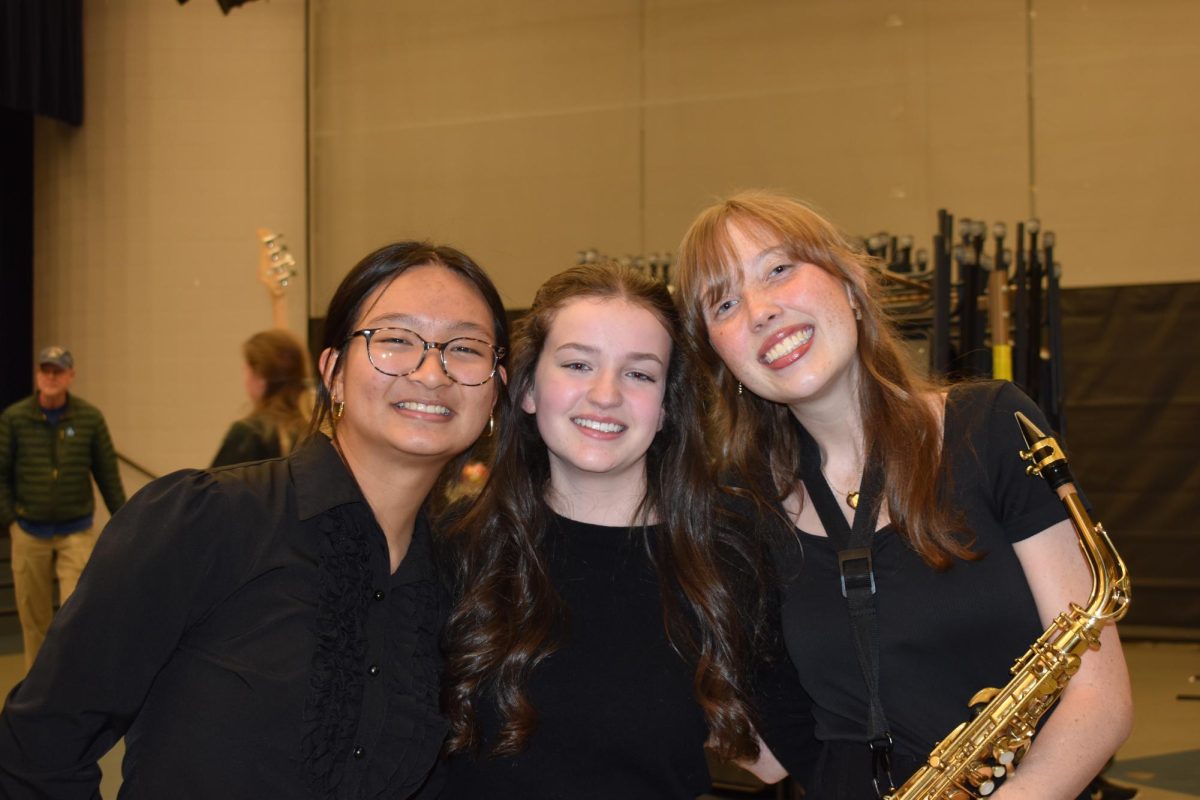 Alice Dong, Mady Ryan, and Annie Kunkel smile after the concert.